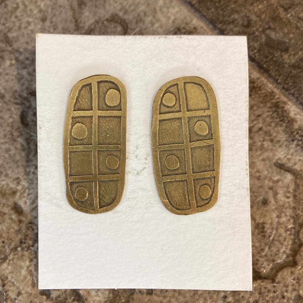 Brass colored, dot patterned earrings